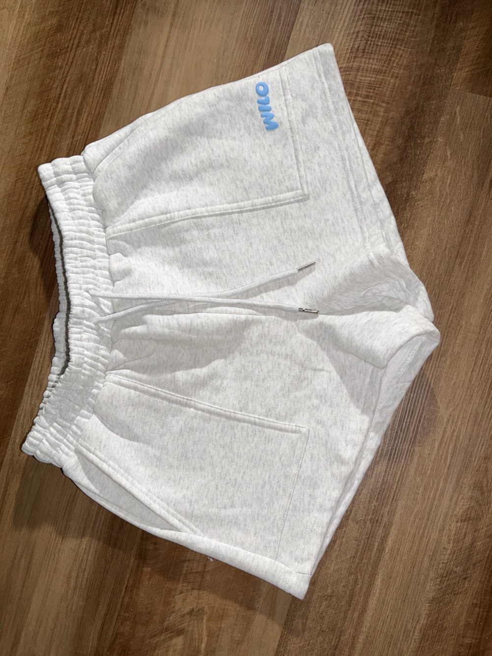 Wilo Women's Light Gray Athletic Shorts with Blue Logo